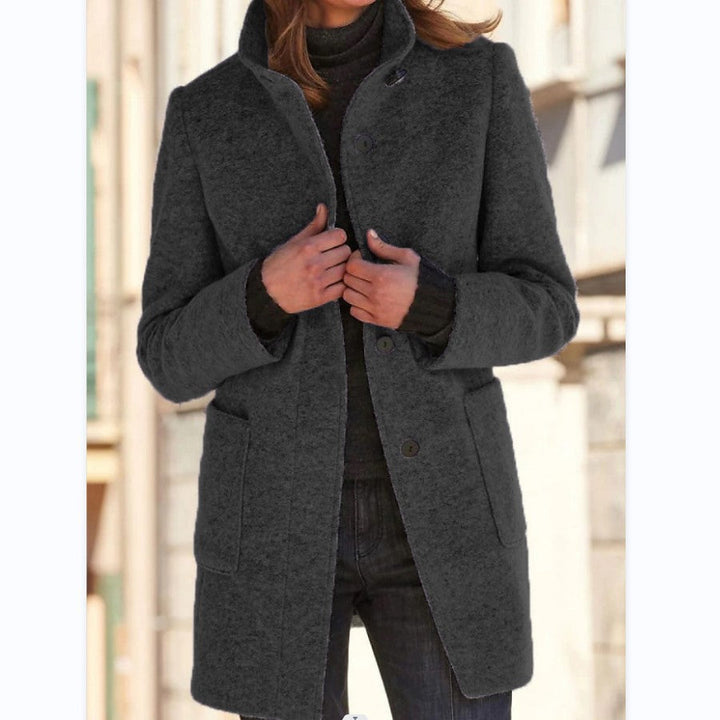 Elegant lang frakke med knapper