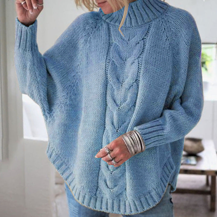 Elegant poncho-inspireret trøje