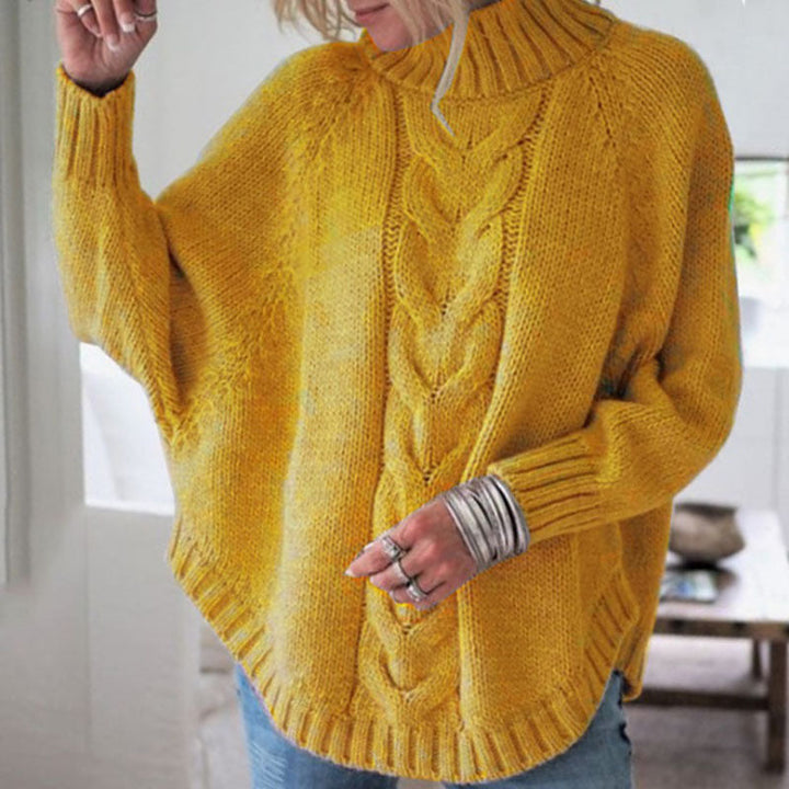 Elegant poncho-inspireret trøje