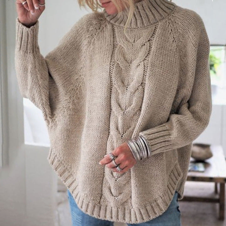 Elegant poncho-inspireret trøje