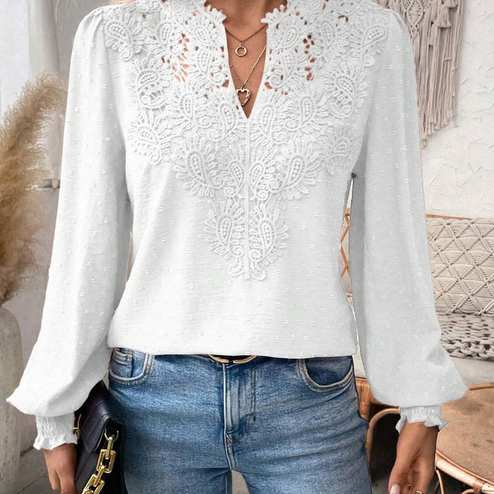 Elegant damebluse med løse ærmer